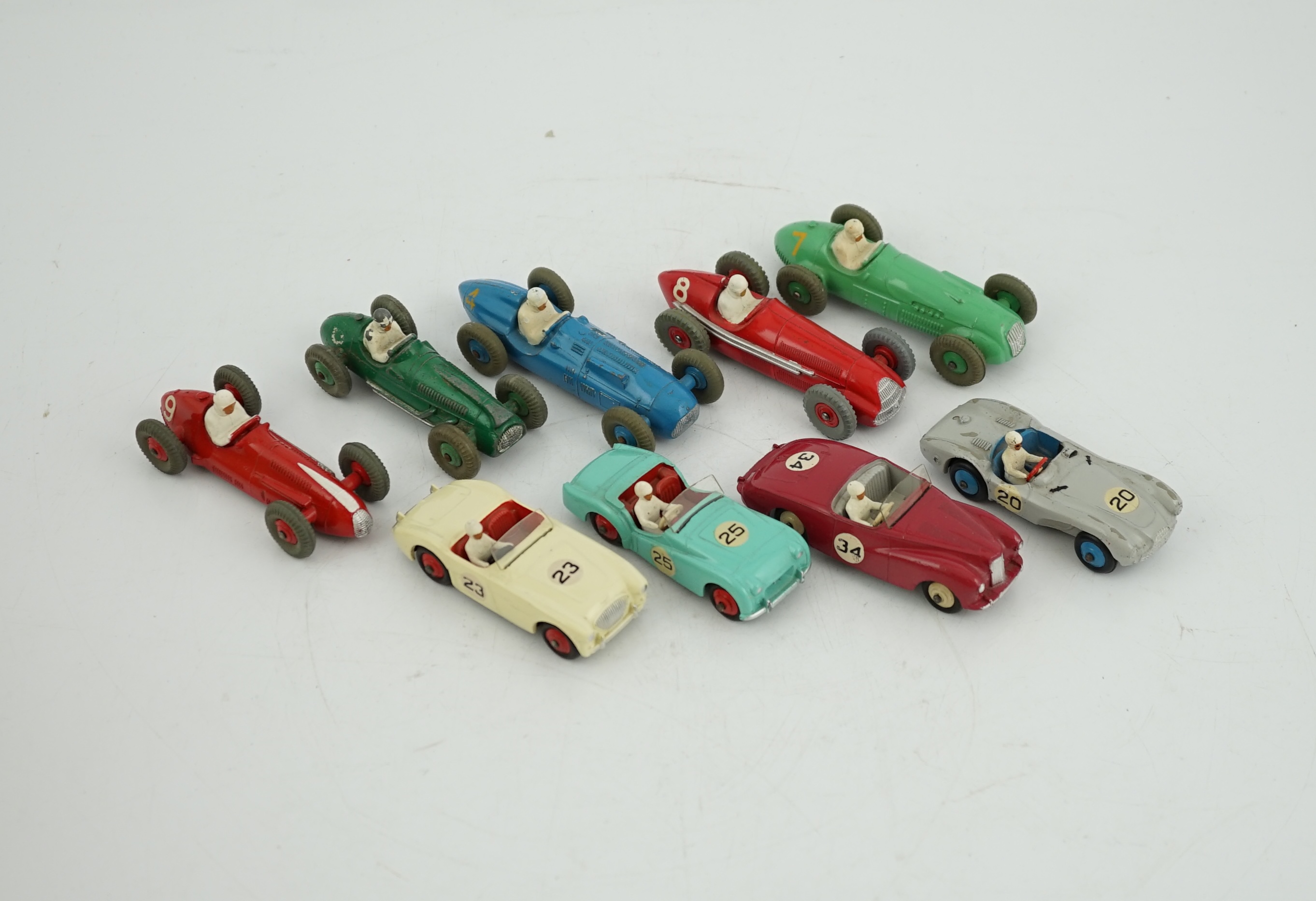 Nine Dinky Toys racing cars, including; Austin Healey, Triumph TR2, Sunbeam Alpine, Aston Martin, HWM, Alfa-Romeo, Talbot Lago, Cooper-Bristol and Maserati